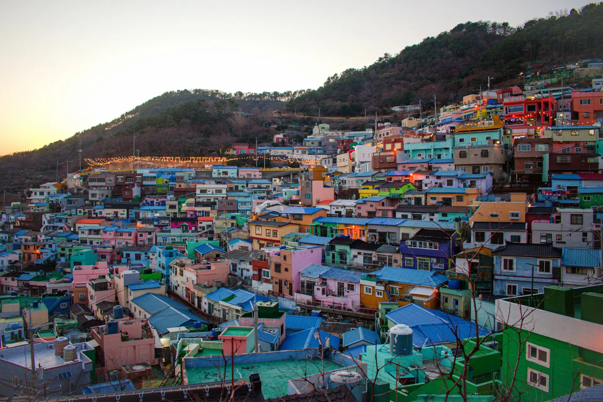 a large group of colorful houses on a hill